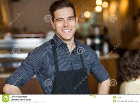 Happy Male Owner In Cafe stock image. Image of coffee - 37129727