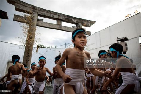 In This Picture Taken On February Japanese Boys Step Out Of The News Photo Getty Images