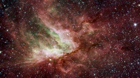 The Omega Nebula Hidden Universe From Nasa Spitzer