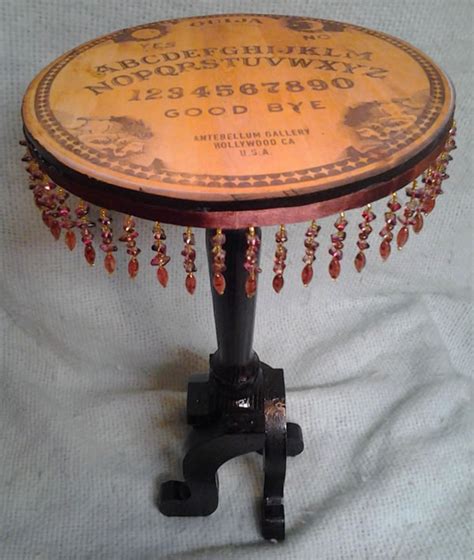 Even though there are still 3 bars underlining the term ouija they're a different size than on the last board. "Don't Play it Alone!" 16 Ouija Board Inspired Tables ...