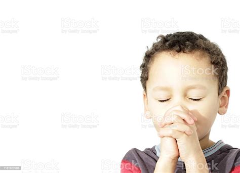 Little Boy Praying To God Stock Photo Download Image Now Beauty