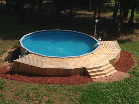 Above Ground Pool And Deck Best Above Ground Pool Above Ground Pool Landscaping Backyard Pool