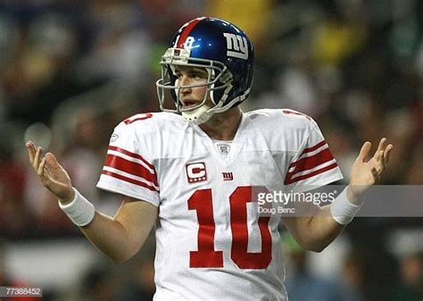 Quarterback Eli Manning Of The New York Giants Looks To The Sidelines