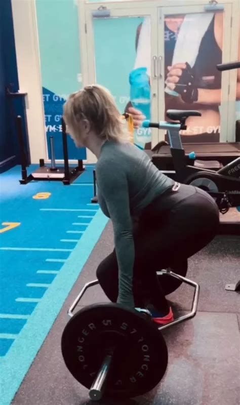 Carol Vorderman Distracts Fans With Award Winning Bum As She Squats In