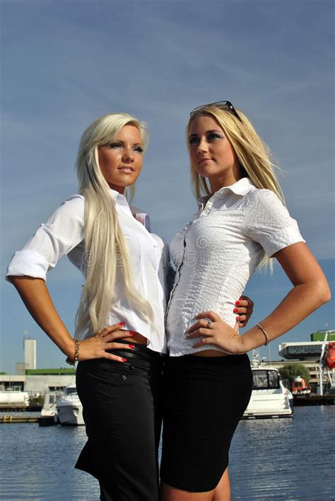 Two Girls Blonde Stand On The Pier Stock Photo Image 20691092