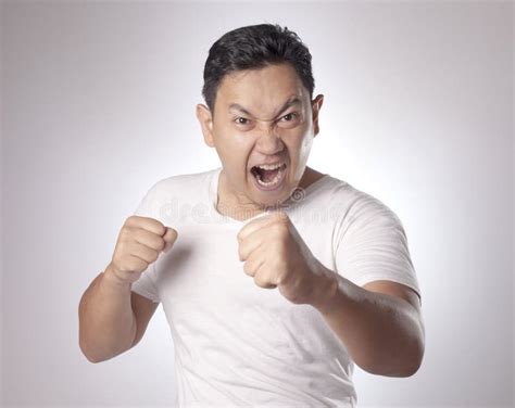 Angry Asian Man Expression Ready To Fight Stock Photo Image Of Angry