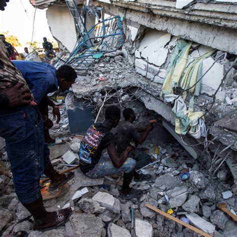 Earthquake In Haiti Updates Haiti News Search For Survivors After Quake Kills Nearly 1300