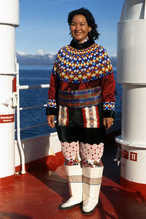 Greenlandic Inuit Woman in traditional dress on cruise ship off West ...