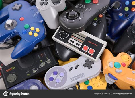 Old School Video Game Controllers - Stock Editorial Photo © robtek #278169116