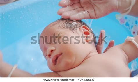 Baby Newborn Unrecognizable Mother Bathing Her Stock Photo 1426988009
