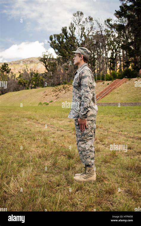 Military Soldier Standing At Attention Posture In Boot Camp Stock Photo