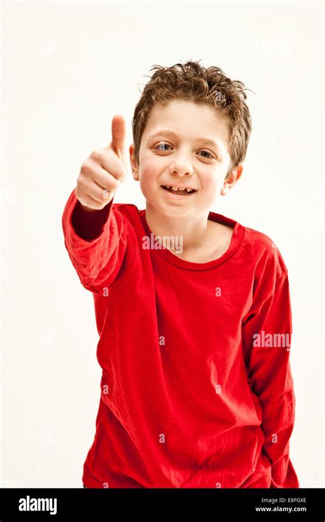 Young Boy Giving Thumbs Up Gesture Stock Photo Alamy