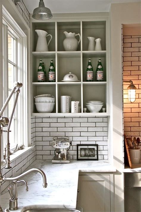 Make open shelving work in a corner space. An open shelf in the corner would eliminate that scary ...