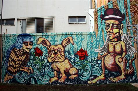 This Surreal Street Art Painting By Dinho Bento Shows How Bizarre Human