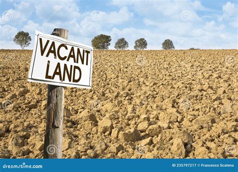 Plowed Field With Signboard And Vacant Land Text Land Plot Management