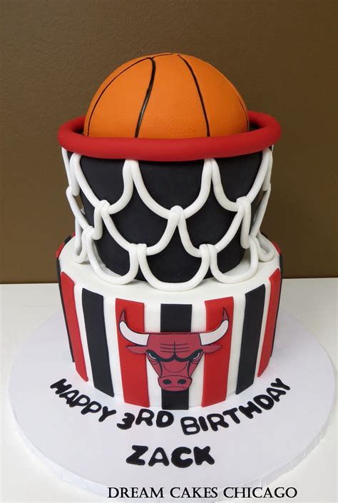 A Birthday Cake Made To Look Like A Basketball Hoop With The Chicago Bulls On It
