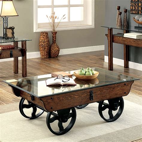 A stunning vintage wooden table with a glass top. Tristin Rustic Glass Top Wooden Coffee Table with Black ...