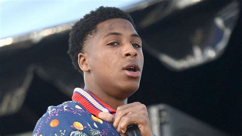 Nba Youngboy Is Wearing Blue Red Dress Standing In Blur Background Hd