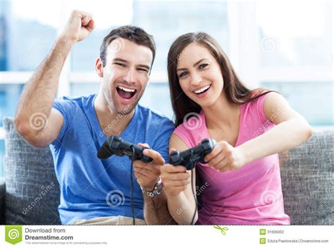 Couple Playing Video Games Stock Photo Image Of Couch