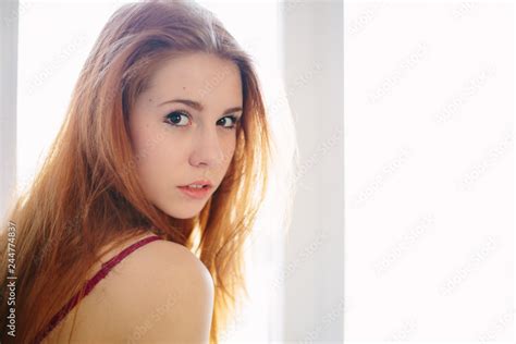 Sexy Redhead Girl Posing At Home Studio Stock Photo Adobe Stock