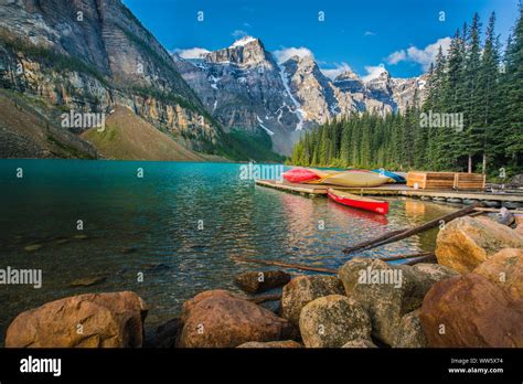 Canoes At Moraine Lake In The Banff National Park Alberta Canada