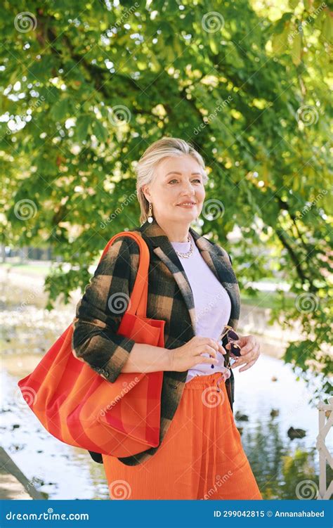 Outdoor Portrait Of Happy And Healthy Mature 50 55 Year Old Woman Stock Image Image Of