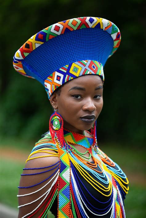 this elegant zulu basket hat in blue with a beaded band is the perfect accessory to upgrade any