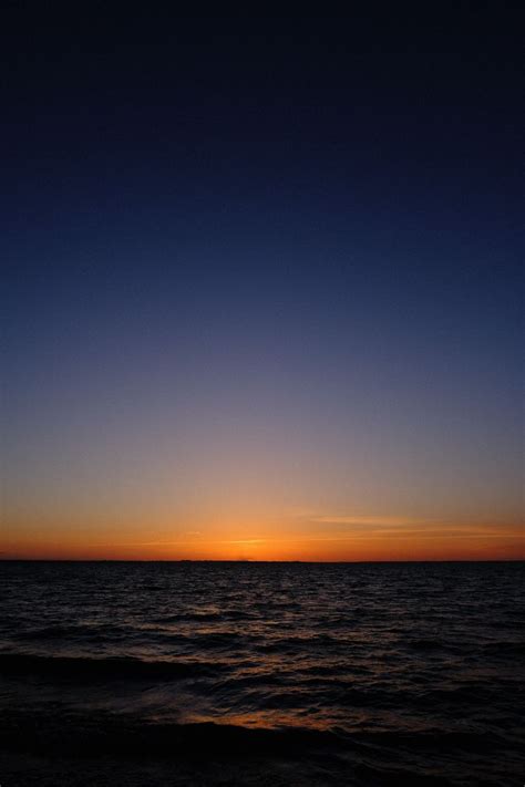 Download Wallpaper 800x1200 Sea Horizon Sunset Sky Dark Night