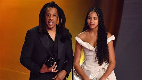 beyonce s daughter blue ivy 12 stuns in white gown as she accepts grammy with dad jay z