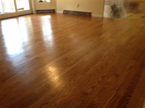 Choosing a stain color for our red oak hardwood floors was much harder and more stressful than anything, in my opinion. red oak with Golden Oak stain by minwax. Here's a pic with ...