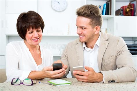 Mother And Son With Smartphones Stock Image Image Of Europeans Table