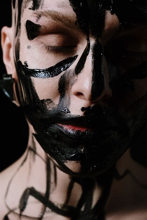 Woman With Black And White Face Paint · Free Stock Photo