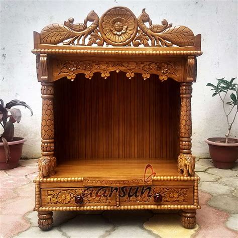 Building a mandir unit in the corner of a room is a great space saving idea. Beautiful Peacock Design Wooden Mandir for Home MNDR-0135