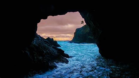 1920x1080 Cave Sunset Sea Laptop Full Hd 1080p Hd 4k Wallpapersimages