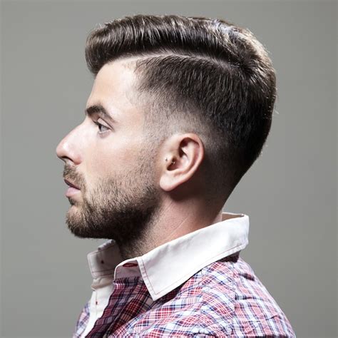 Most men's haircuts are short on the sides and back, with a gradual taper to the longer hair on top. Popular Men's Haircuts: Shaved Sides