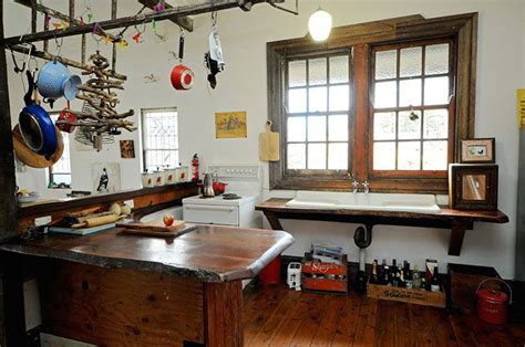 We love toilets next to kitchens. New buyers loved this salvaged restoration at first sight ...