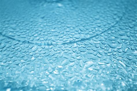 Water Droplets On Blue Glass Surface Picture Free Photograph Photos