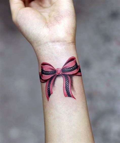 Ohm tattoo dual oultine on wrist. 75 Trendy Bow Tattoo Designs