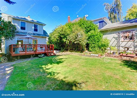 House With Backyard Walkout Deck And Patio Area Stock Image Image Of