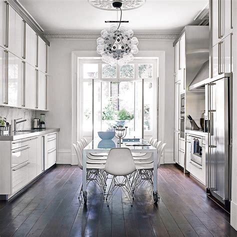 To get the most out of those bright white cabinets, we've paired a medium brown hardwood floor: Kitchen flooring ideas - for a floor that's hard-wearing, practical and stylish