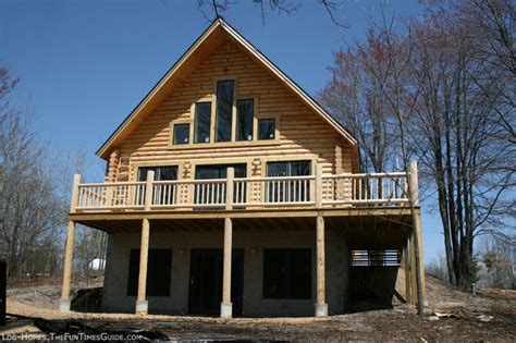 This cabin has an open dining/kitchen/living room downstairs, with one bedroom and a full sized bathroom. cabin basement walkout - Google Search | upstate | Pinterest