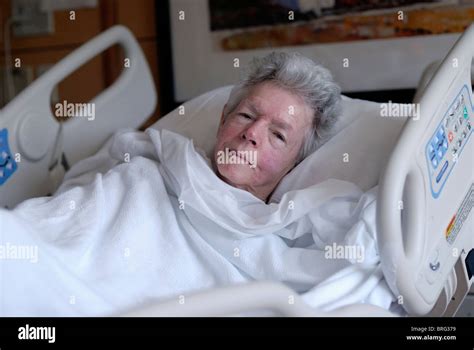 80 Year Old Woman Lying In A Hospital Bed Stock Photo Alamy