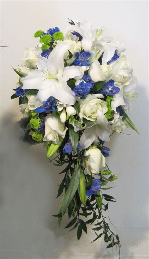 This hand tied silk wedding bouquet has a lot of greenery. fusion - Dahlia Floral Design