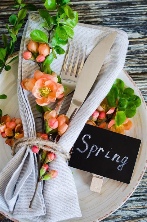 Festive Table Place Setting With Spring Blossoming Branch On Wooden