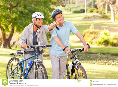 Mature Couple With Their Bikes Stock Photo Image Of Woman Retired