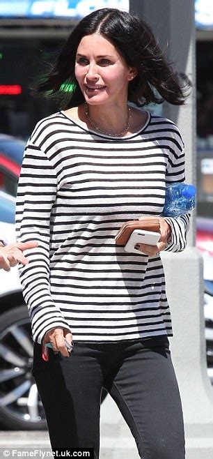 Courteney Cox In Striped Long Sleeve T Shirt As She Shops For Home