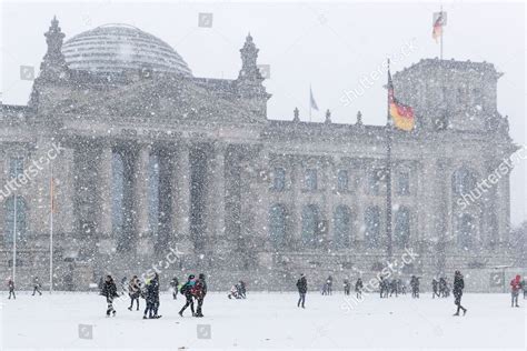People Walk Snow Reichstag Building Berlin Germany