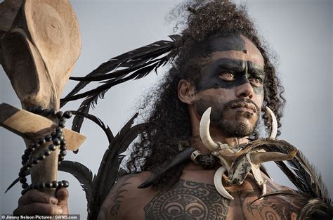 moving images show the indigenous people at risk of extinction around the globe daily mail online