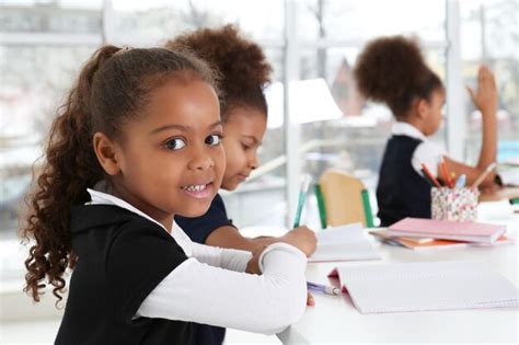 Premium Photo Cute African American Girls In Classroom