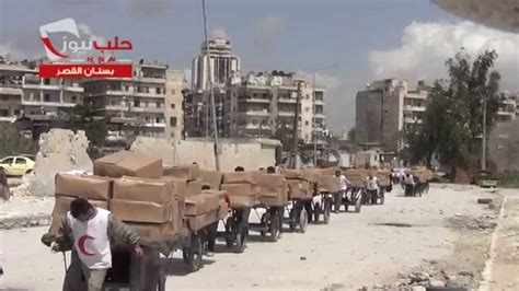 حلب بستان القصر منظمة الأمم المتحدة مع الهلال الأحمر يقومون بادخال